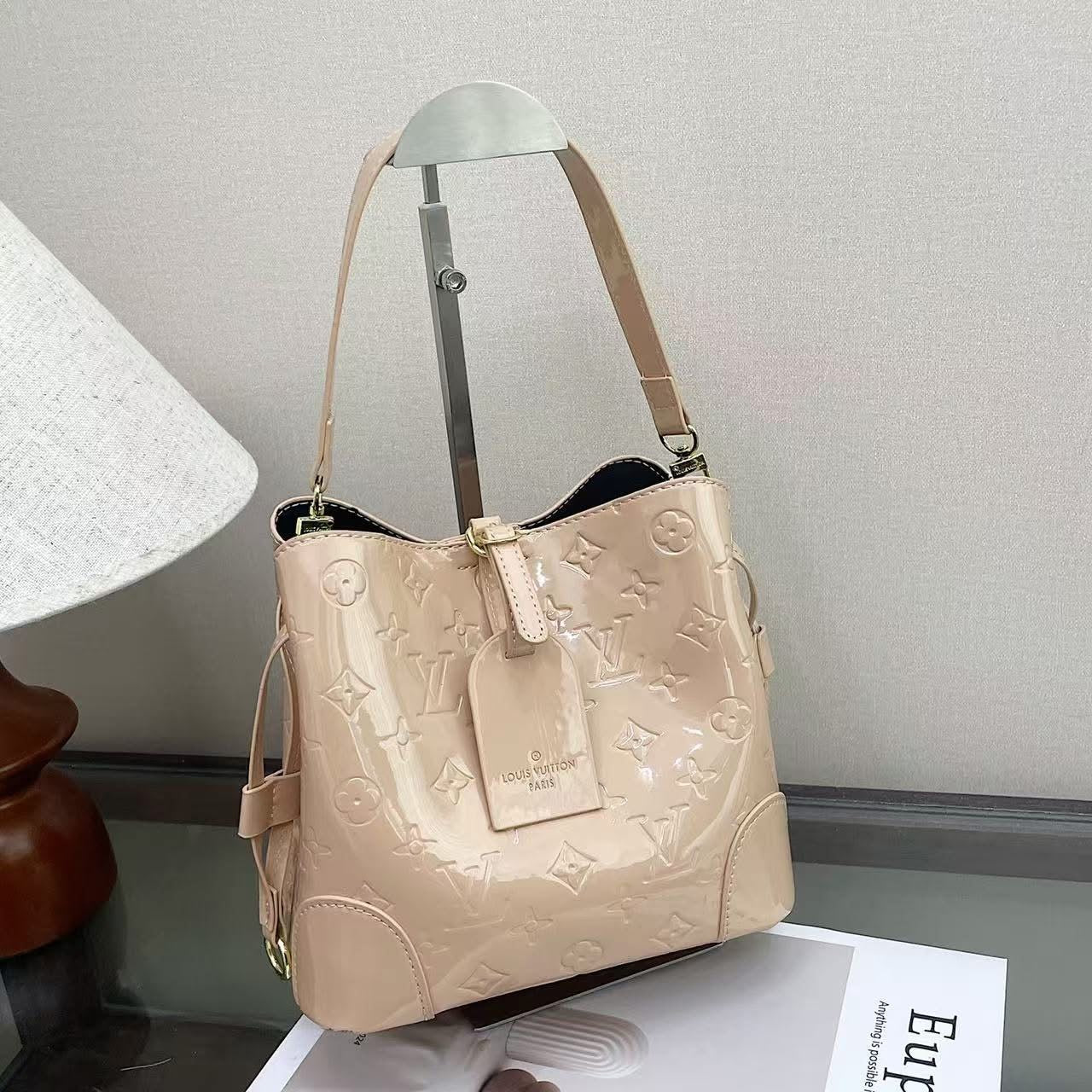 Vee glossy tan bucket bag