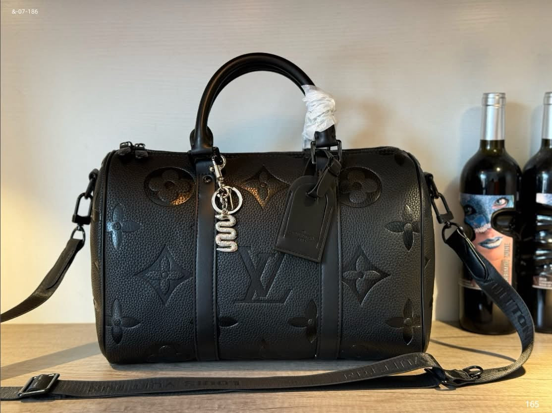 Black embossed speedy