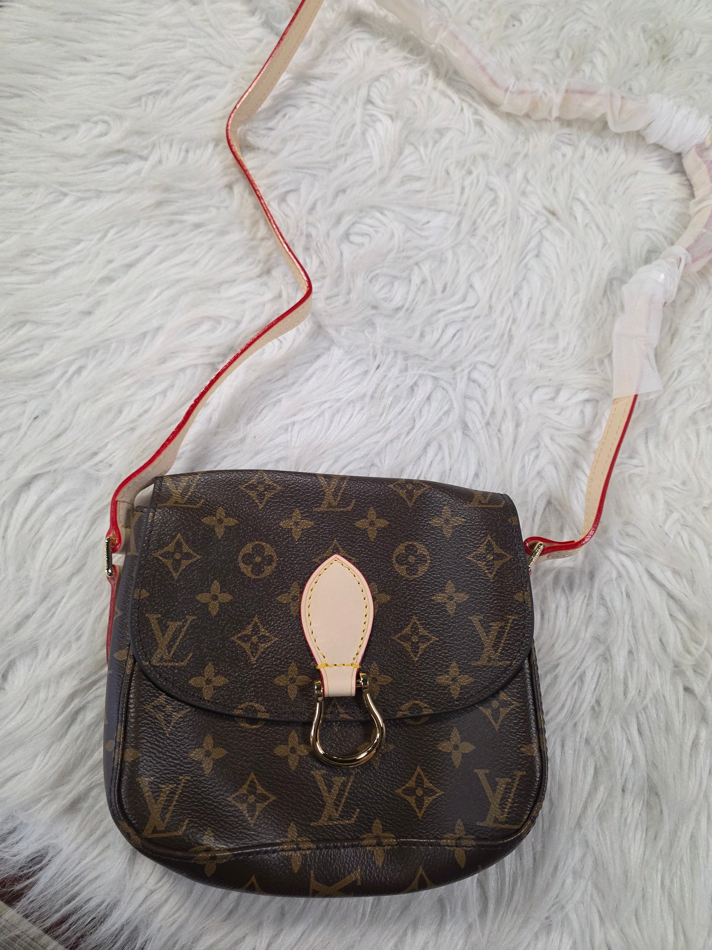 Vee oval crossbody